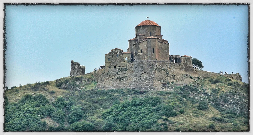 Jvari Monastery perched on a hilltop overlooking Mtskheta, a historic Georgian Orthodox site.