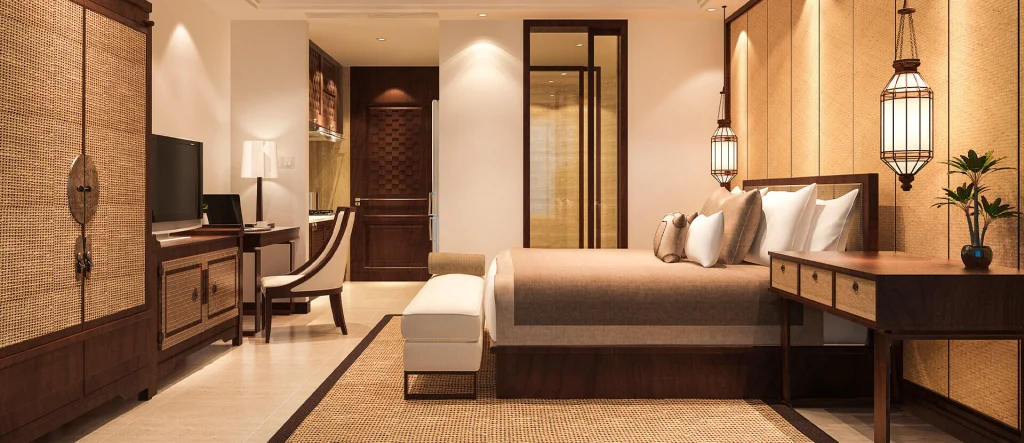 Litz Resort — Elegantly furnished guest bedroom with wooden accents, large bed, and soft lighting.