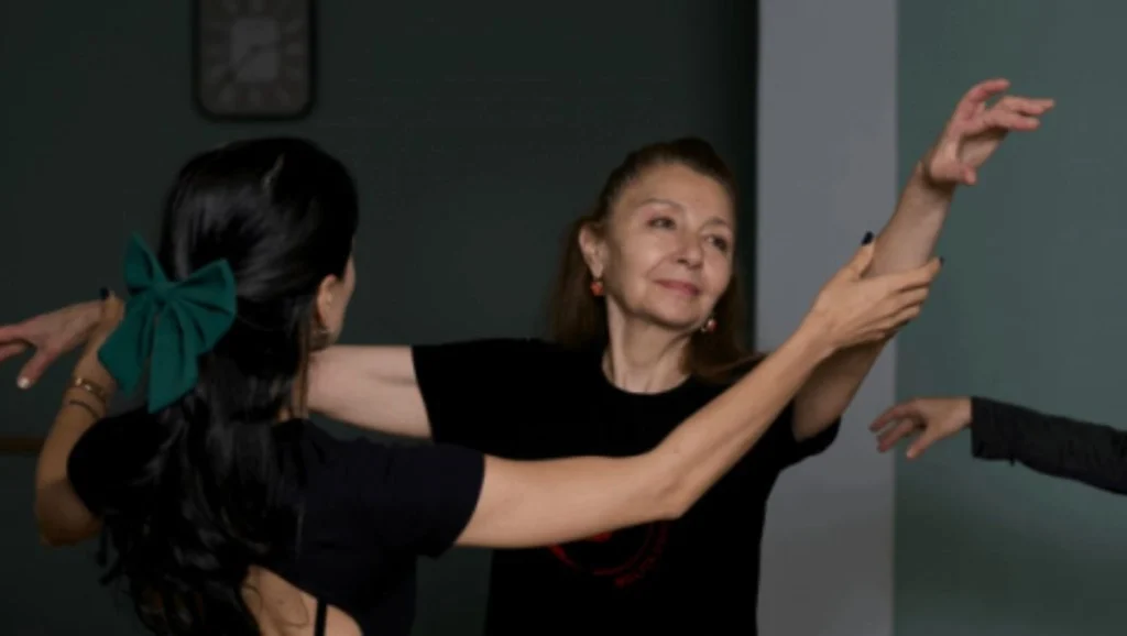 Melita Dance Studio — Two women practice a partnered dance pose inside the studio.