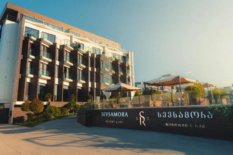 Sevsamora Resort & Spa — Modern multi-story resort building exterior with balconies and signage under clear sky.