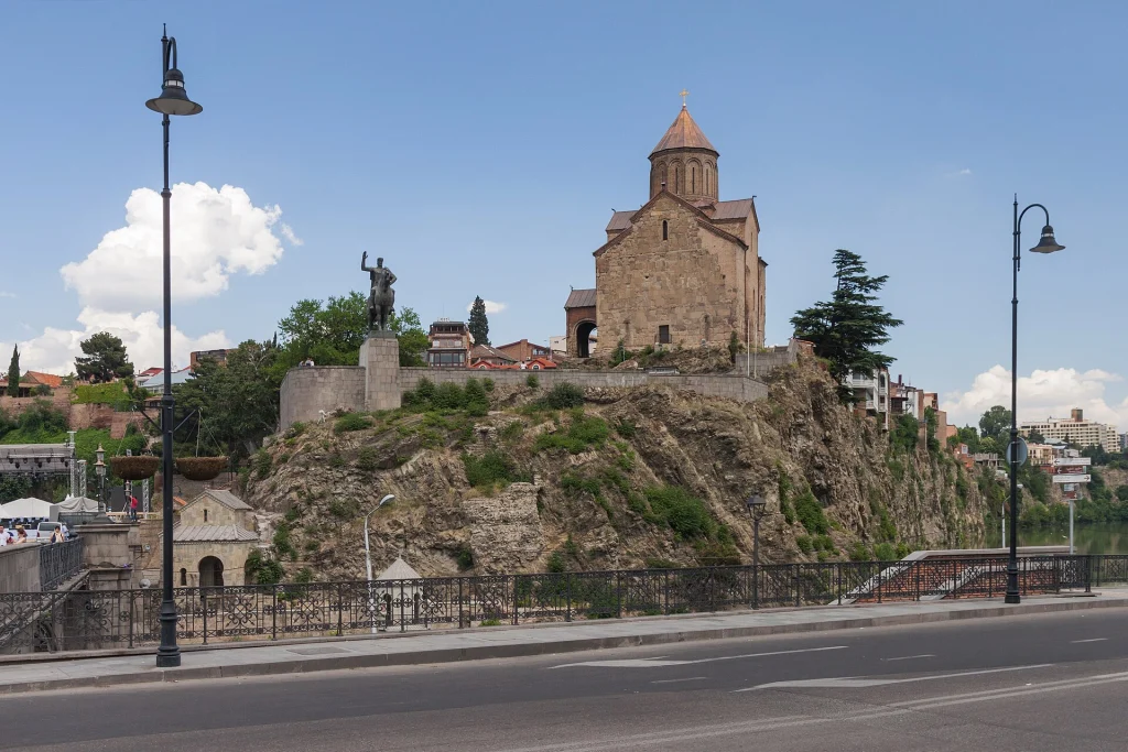 Metekhi Church overlooking Tbilisi, the capital city most visa-free arrivals will reach.