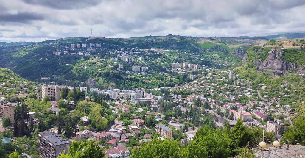 Panoramic view of Chiatura's gorge-side cityscape, setting for the October festival.