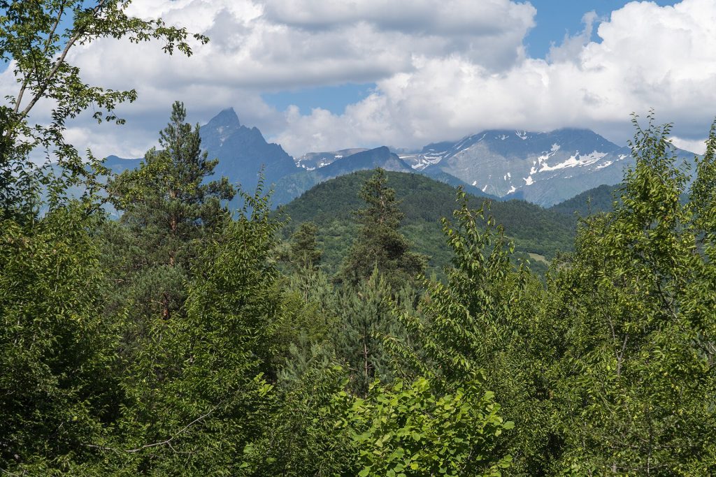 Mountain landscape of Oni Municipality, the Rachan highland setting for the Oneloba town-day celebration.