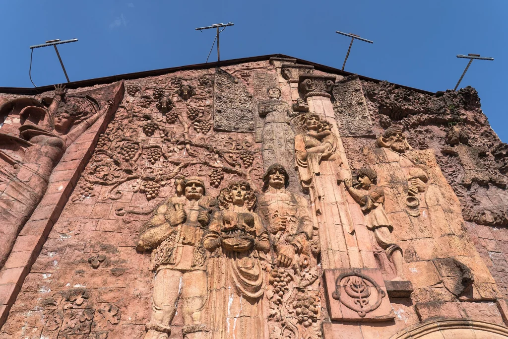 Carved stone relief decorating the facade of the Green Bazaar in Kutaisi.