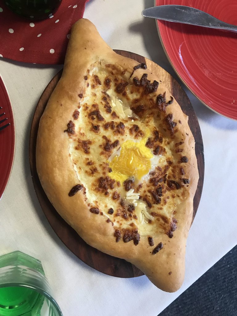 Khachapuri, Georgia's iconic cheese-filled bread, a highlight of the country's culinary culture.