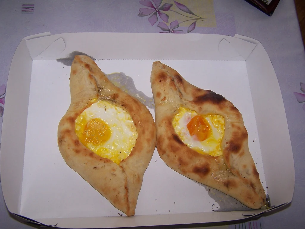 Adjaruli khachapuri, Georgia's boat-shaped cheese bread Dutch visitors should try.