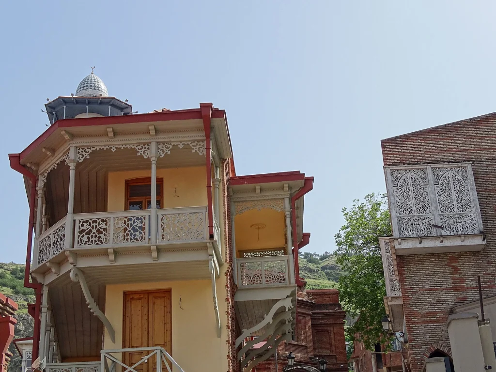 Carved wooden balconies in Tbilisi's Old Town, a highlight for sightseeing visitors.