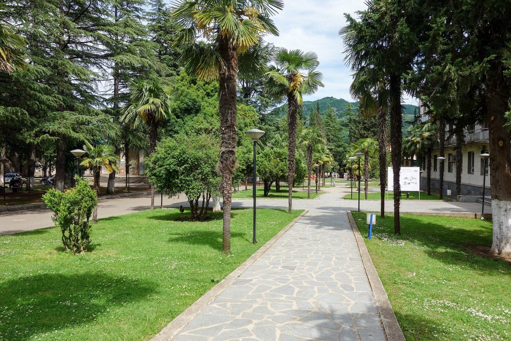 A palm-lined park in Baghdati's town center, a gathering spot during local celebrations.