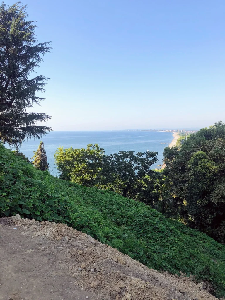 The Black Sea coastline stretches below the hilltop site of Petra Fortress.