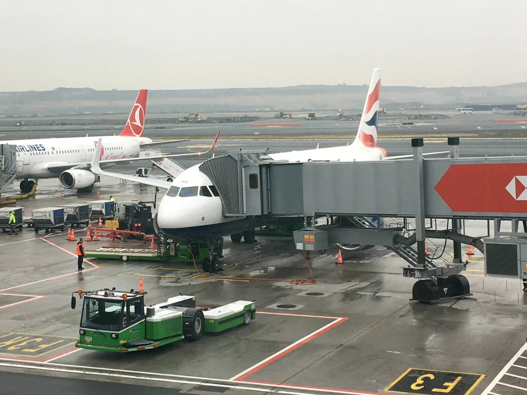Aircraft boarding at Istanbul Airport, a typical one-stop route for Congolese travellers to Georgia.
