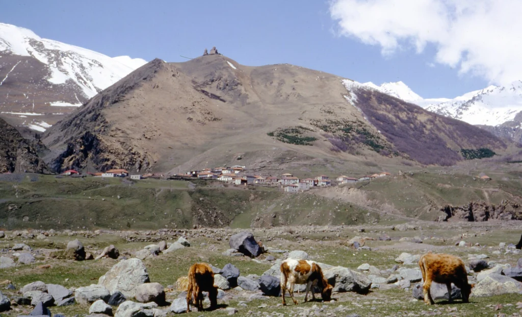 Mountain scenery and village near Mount Kazbek along the Georgian Military Road.