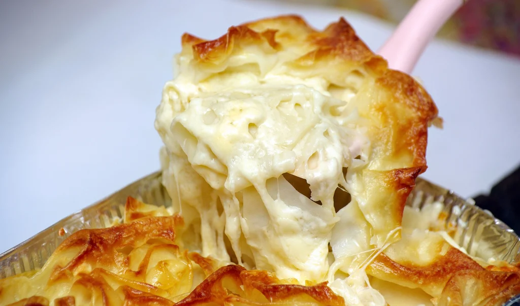 Achma, a layered cheese pastry, is a traditional Georgian dish travelers can sample.