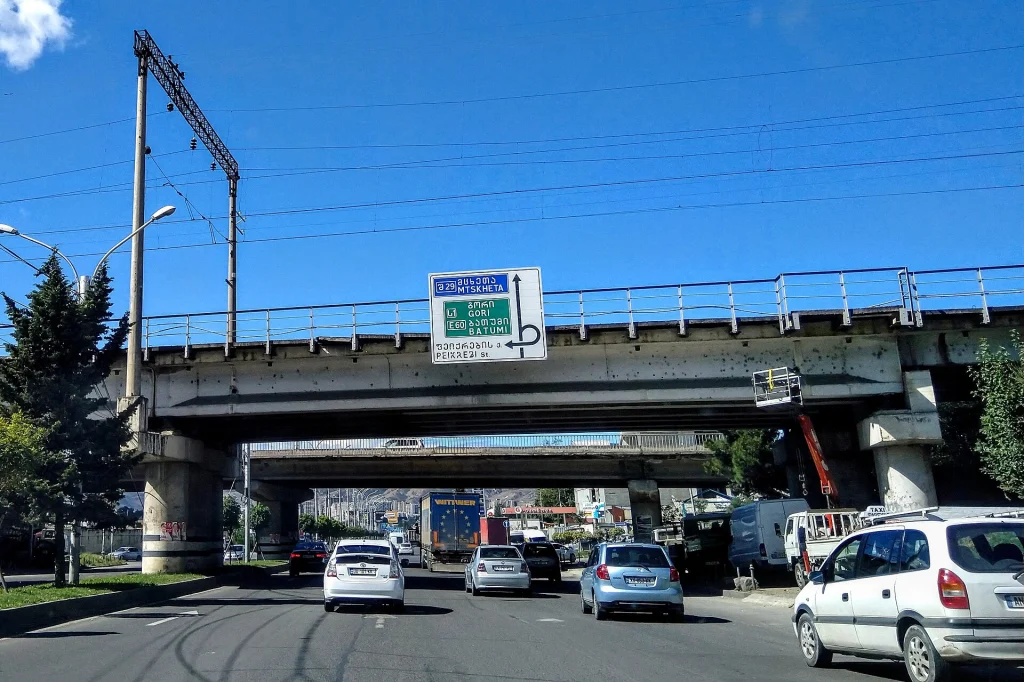 A Tbilisi street direction sign, good practice for sounding out Georgian script on the go.