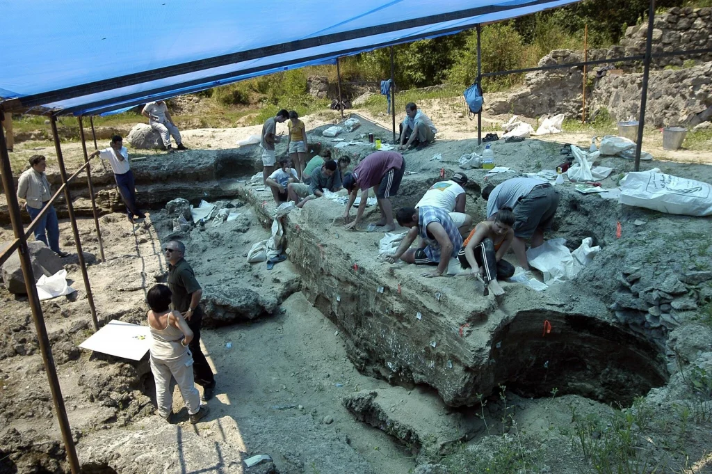 Archaeologists excavate the 1.8-million-year-old prehistoric human site at Dmanisi.