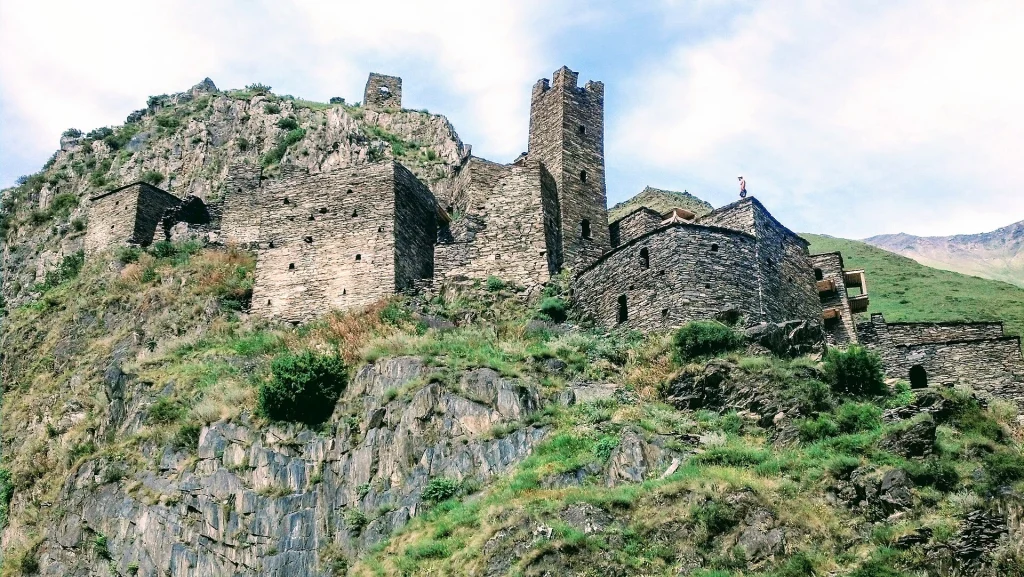 Medieval stone towers and houses of Mutso village rise above the surrounding mountains.