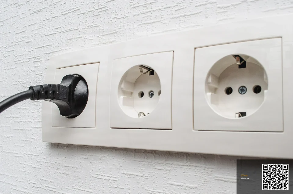 What time zone, plug type and voltage does Georgia use?