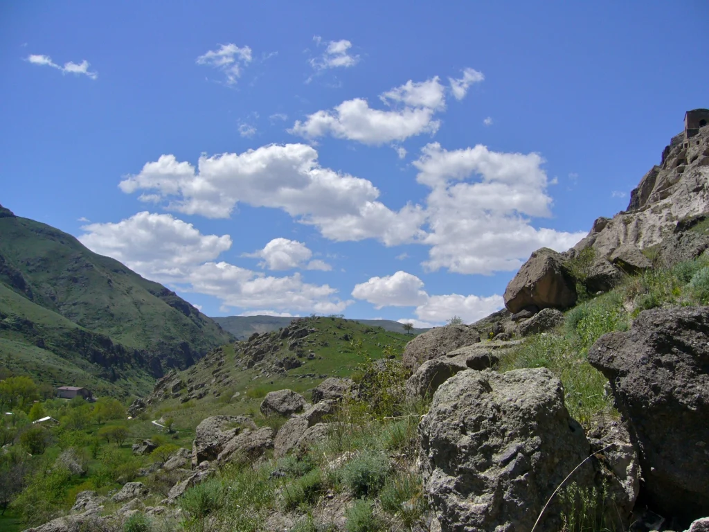 A rural mountainous landscape in Georgia, showing the country's natural scenery.