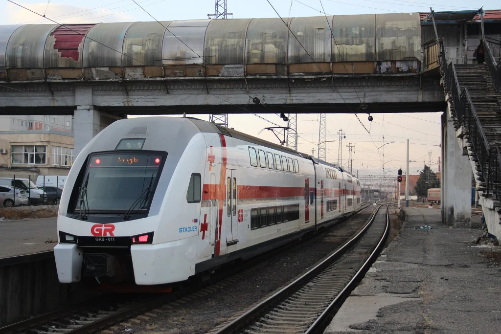 A modern Stadler double-decker train of Georgian Railway departing Tbilisi for Batumi.