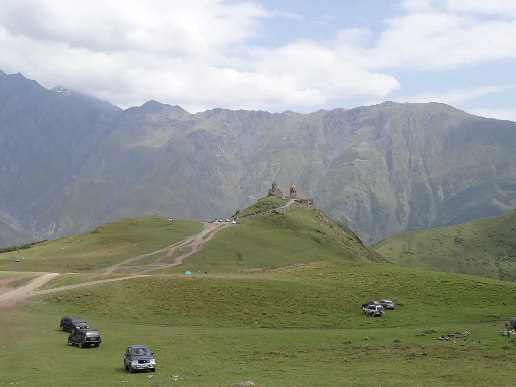 Gergeti Trinity Church perched on a ridge, one of Georgia's most iconic sights near Kazbegi.