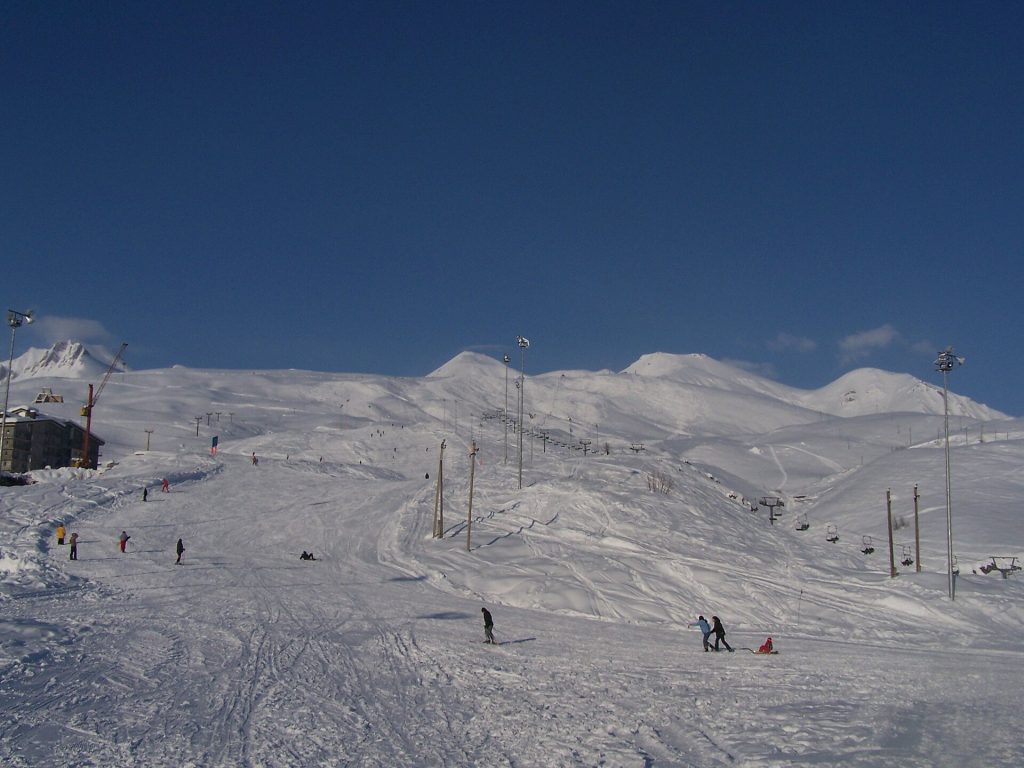 Wide view of Gudauri's ski slopes and lift lines where the freeride event takes place.