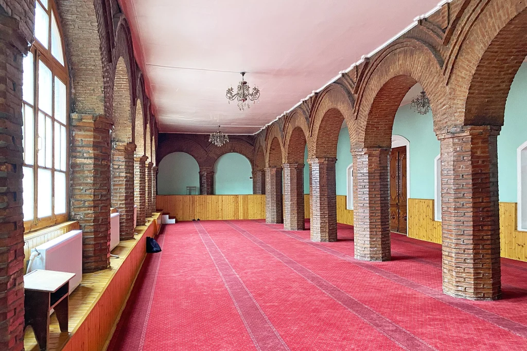 A mosque interior in Shaki, Azerbaijan, reflecting the shared Islamic heritage travellers will recognise.