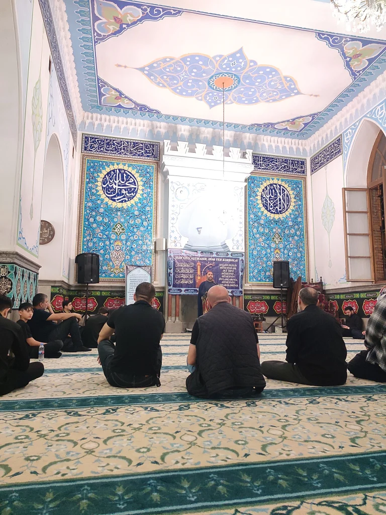 Worshippers gather at Tbilisi's Juma Mosque, the main mosque for Muslim travellers including Palestinians.
