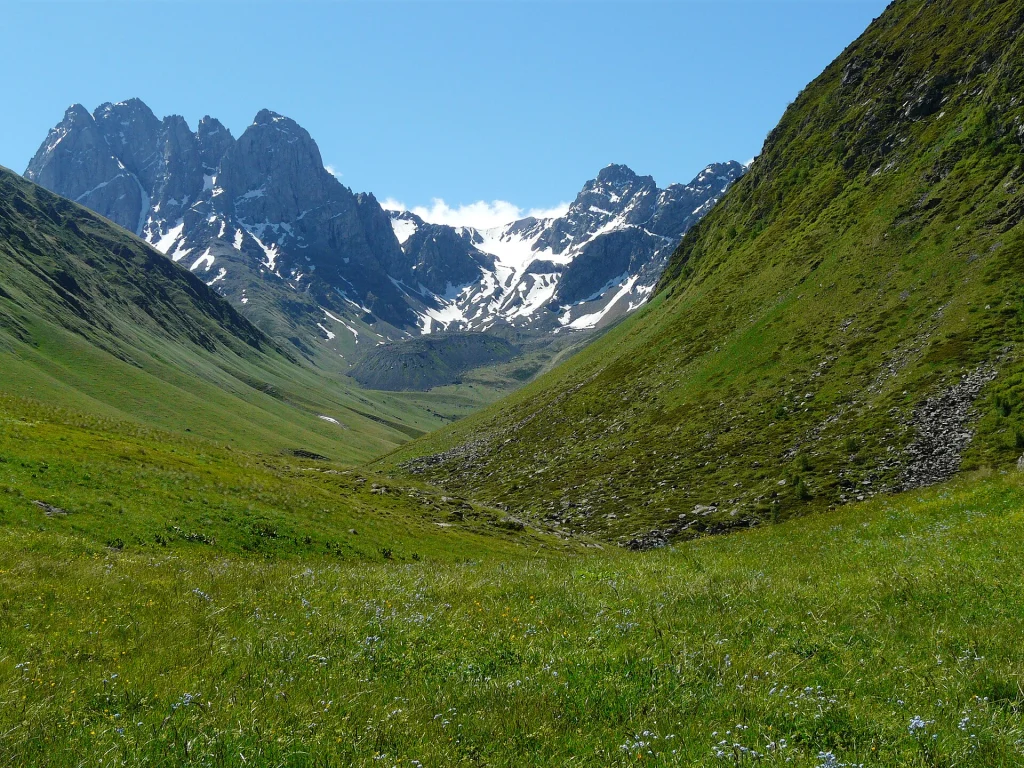 Juta village valley with the jagged peaks of the Chaukhi massif behind.