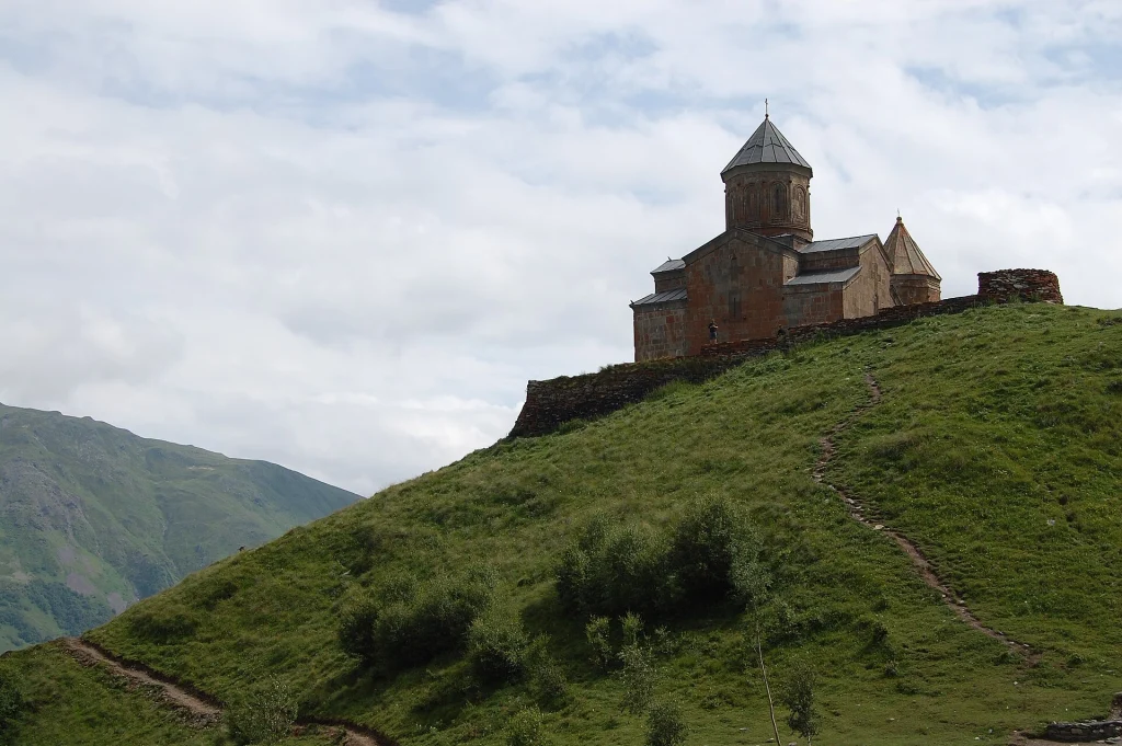 Gergeti Trinity Church above Kazbegi, one of Georgia's most photographed landmarks for travellers.