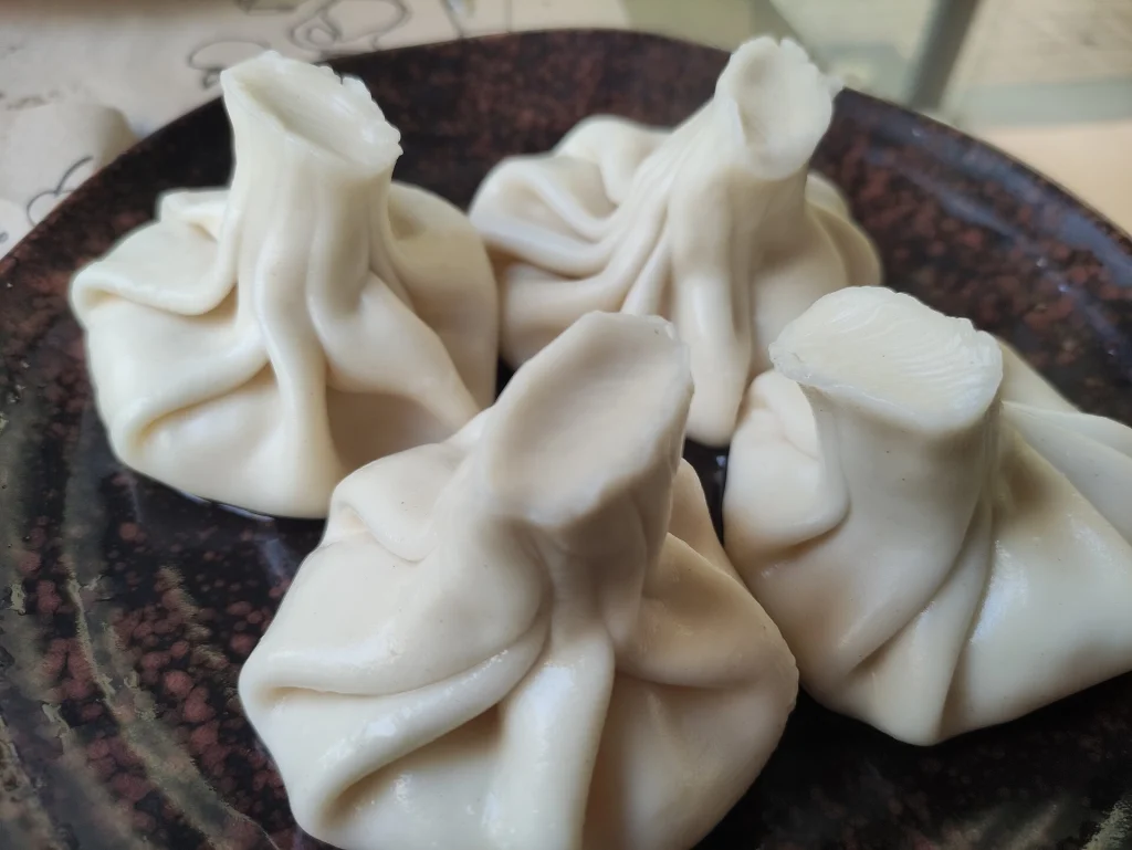 Khinkali, Georgia's iconic dumplings, a dish Yemeni visitors will encounter often.