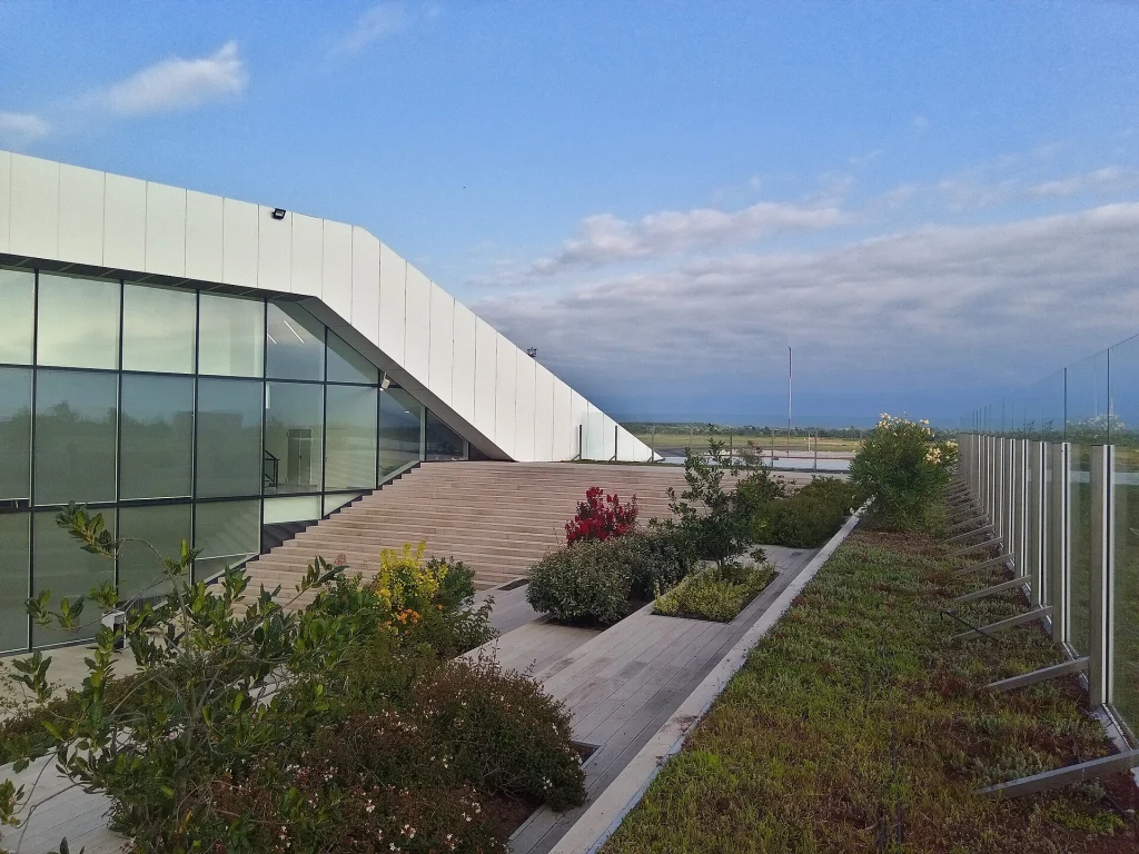 Landscaped terrace with airfield view at Kutaisi International Airport.