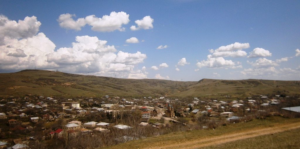 The village of Martkopi under a bright spring sky, setting for the annual Aparnoba feast.
