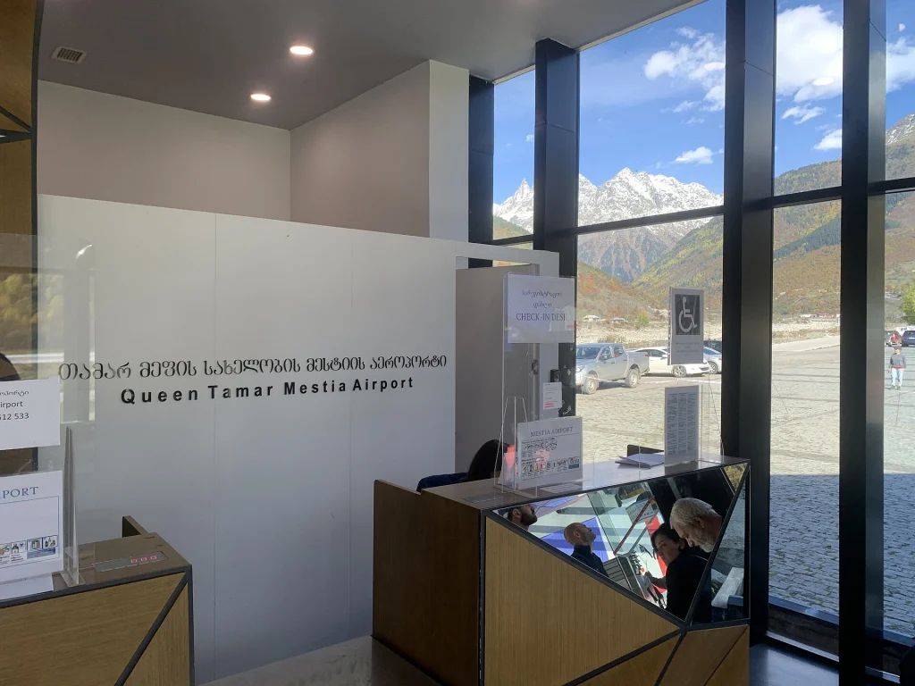 Check-in desk at Mestia airport where passengers register for domestic flights.
