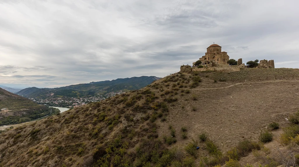 Panoramic view of Jvari Monastery crowning its hill overlooking the Mtkvari and Aragvi river valley.