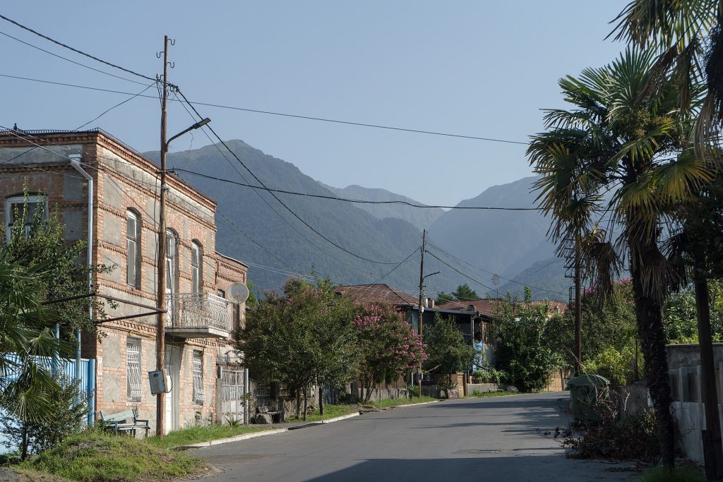 A quiet street in Lagodekhi beneath the Caucasus foothills, heart of the Heretoba festival town.