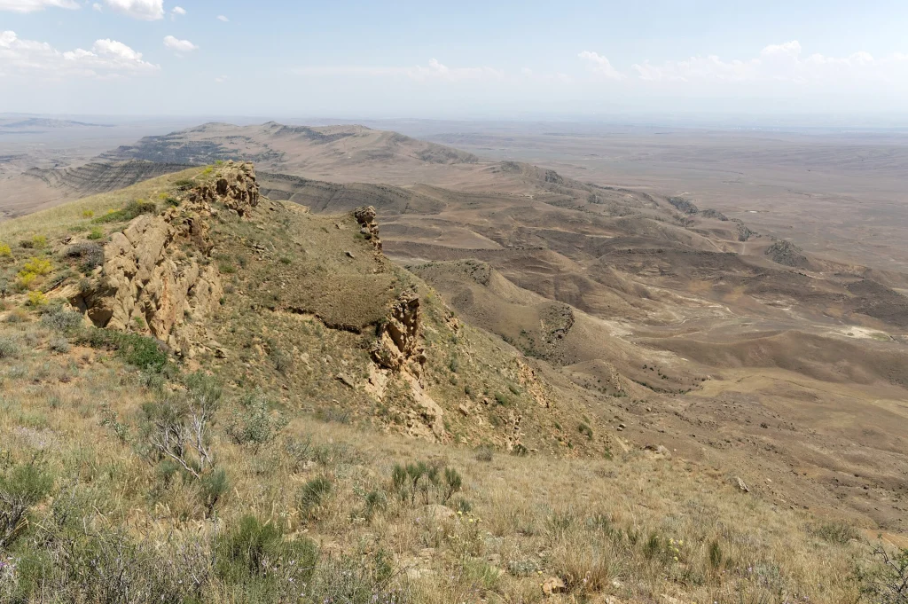 Panoramic view of the rugged semi-desert landscape surrounding Davit Gareja's monasteries.