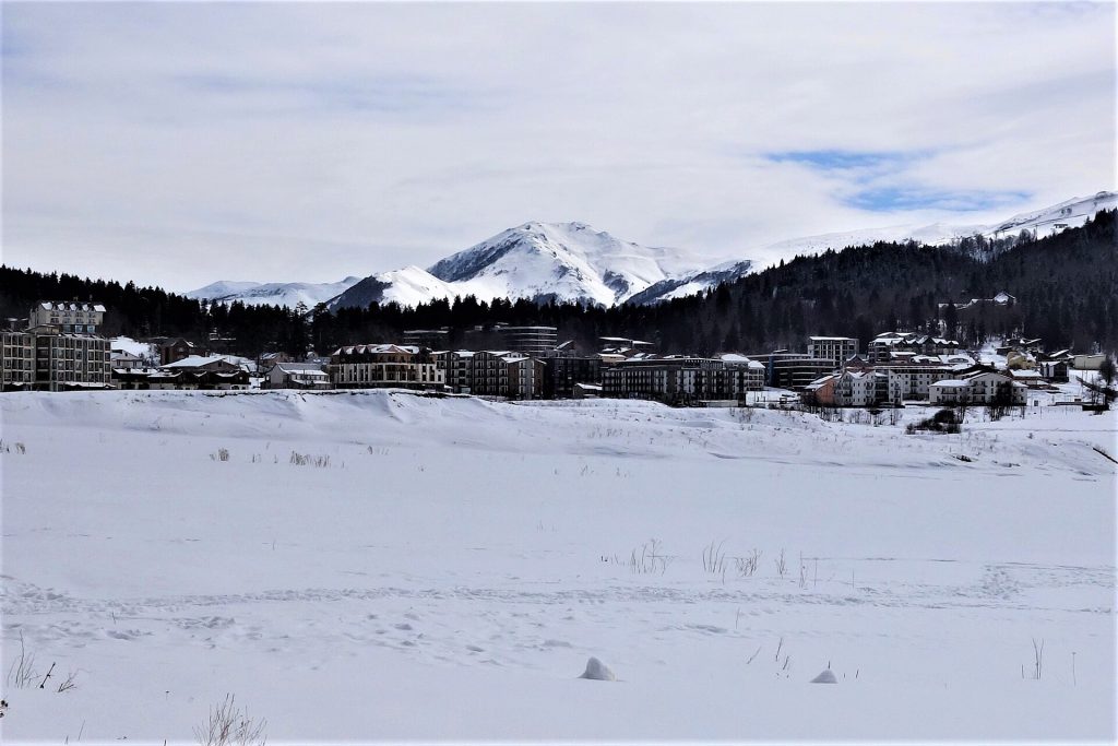 Snow-capped Mount Kenchikara towers over Bakuriani, host of the March winter festival.