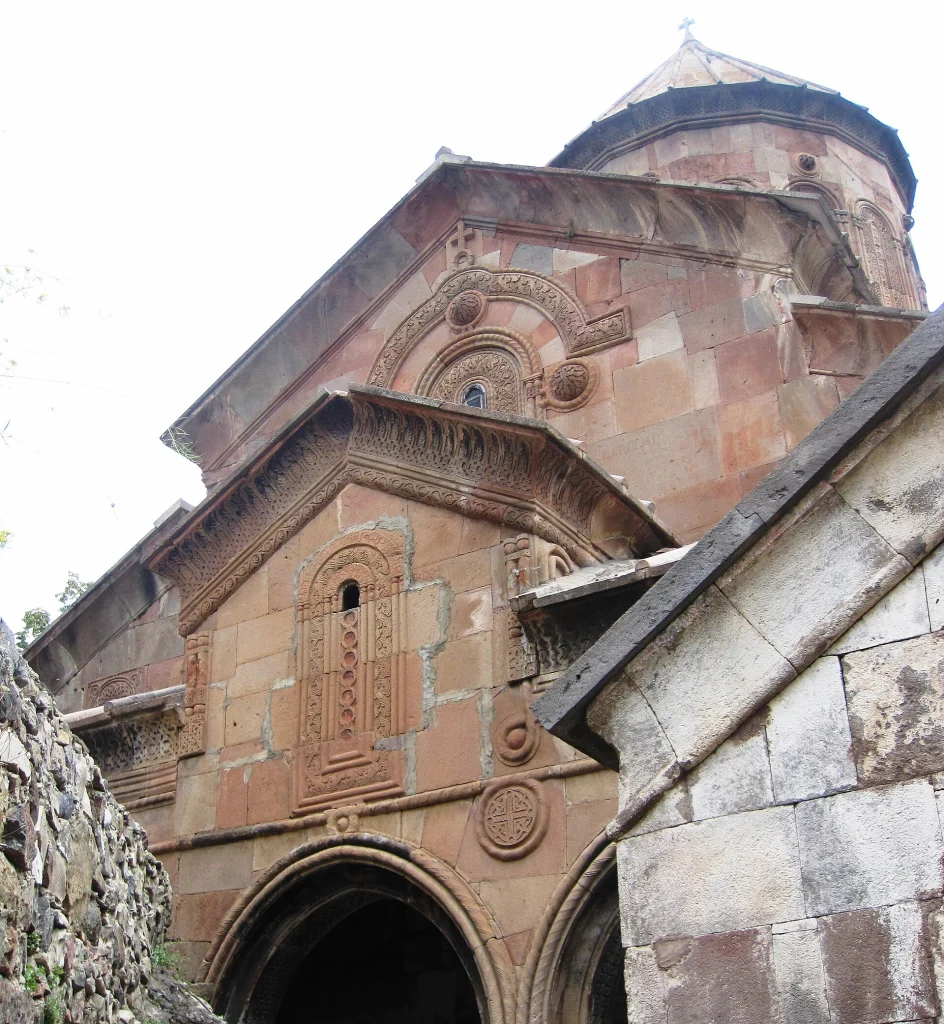 Close view of the ornate stone carvings on Sapara Monastery's main church facade.