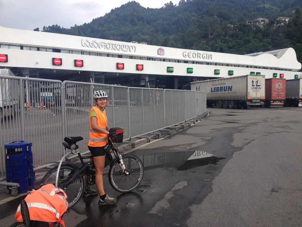A cyclist crosses the Sarpi land border checkpoint between Georgia and Turkey.