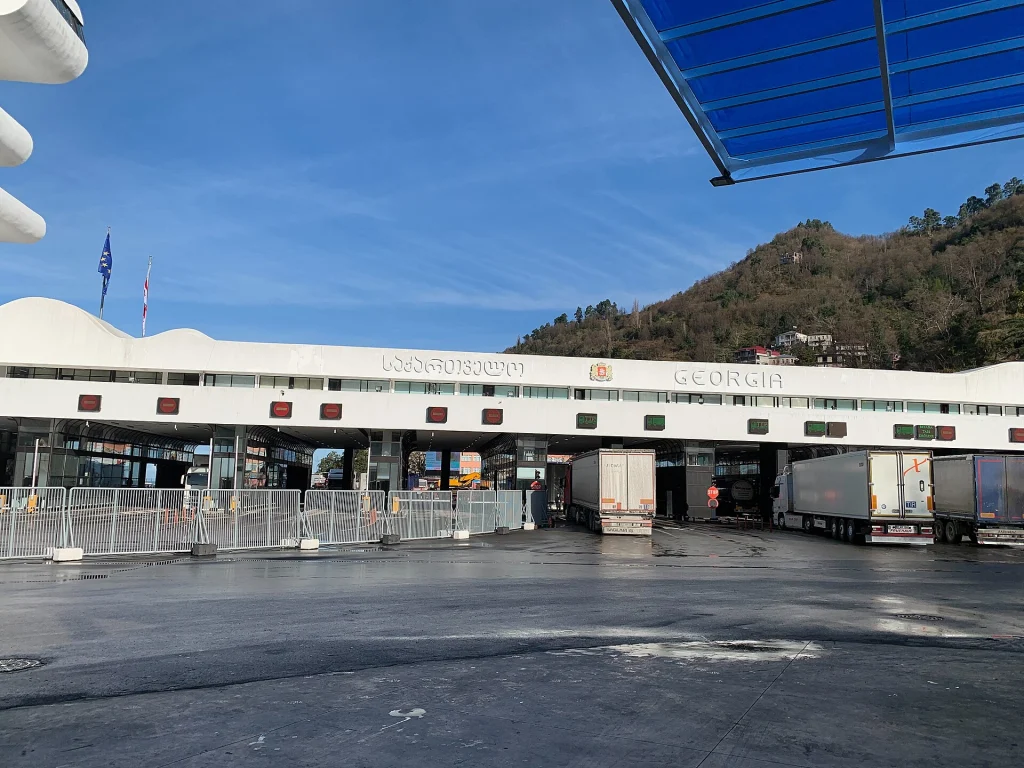 Trucks and crossing lanes at the Georgian side of the Sarpi border entry point near Batumi.