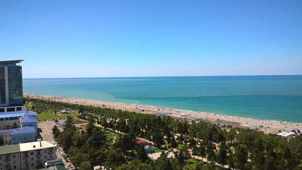 Aerial view of Batumi's seaside promenade and beach on the Black Sea.