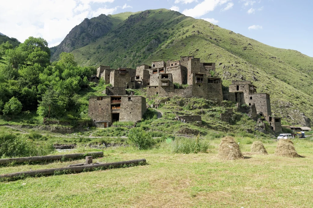 The medieval fortress village of Shatili overlooks the valley near the Anatori crypts.