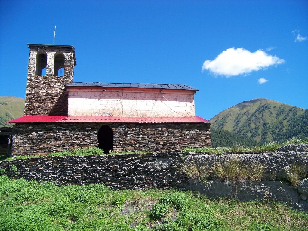 Stone church of St Kvirike and Ivlita with its bell tower, venue for the Kvirikoba feast.