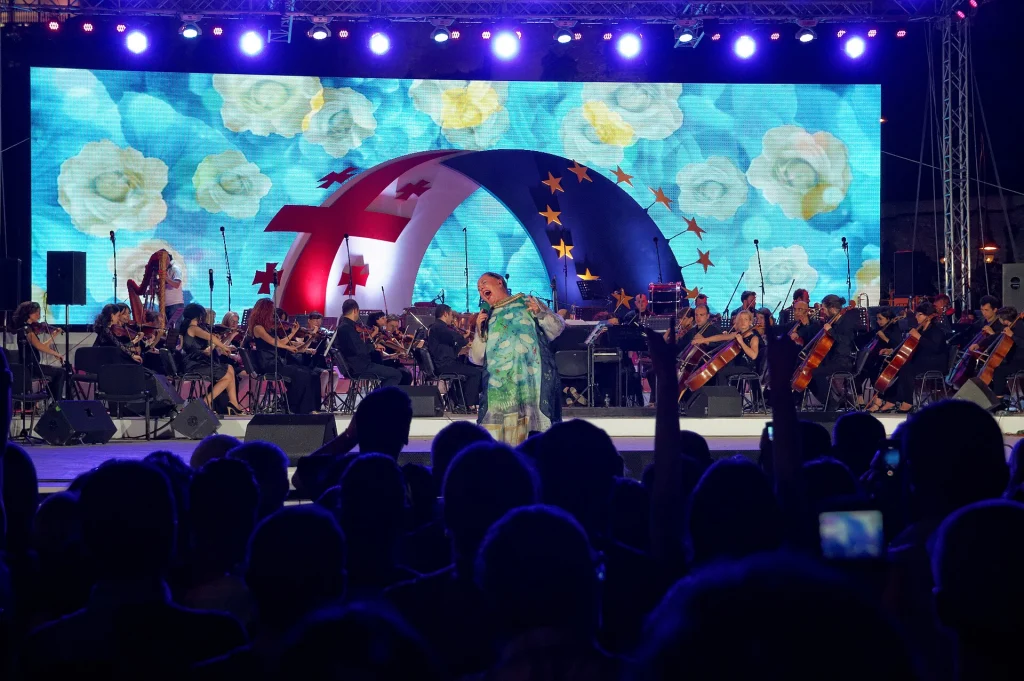 Evening concert and crowd in Tbilisi, Georgia, showing local entertainment culture.