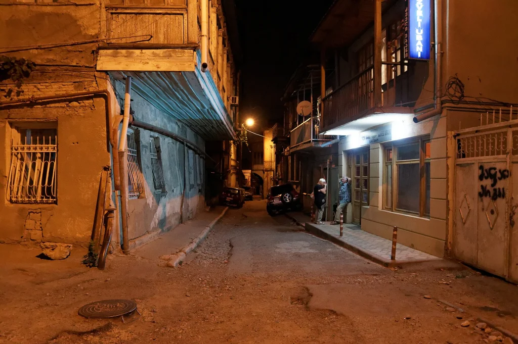 Night view of an Old Tbilisi lane, typical of the capital's 19th-century quarter.