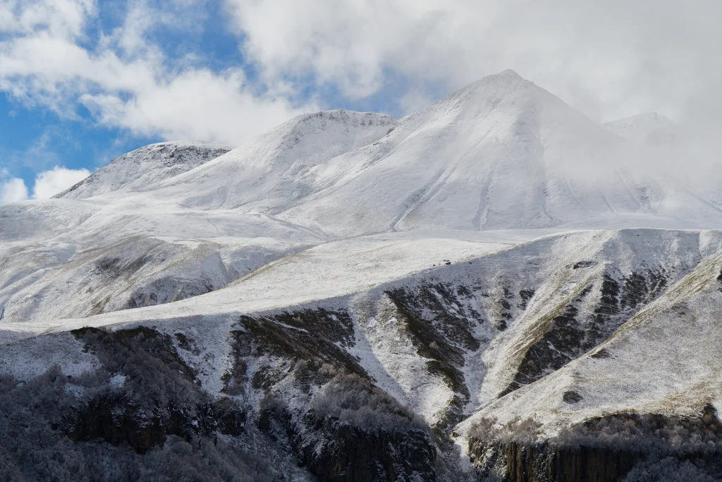 Snow-covered peak in the Caucasus Mountains of Georgia, a landscape travellers may encounter.