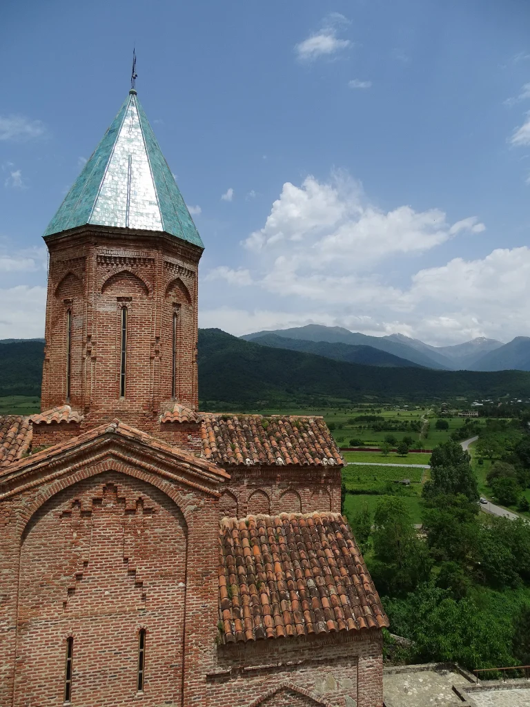 View from the Gremi citadel tower overlooking the Alazani valley and surrounding mountains.