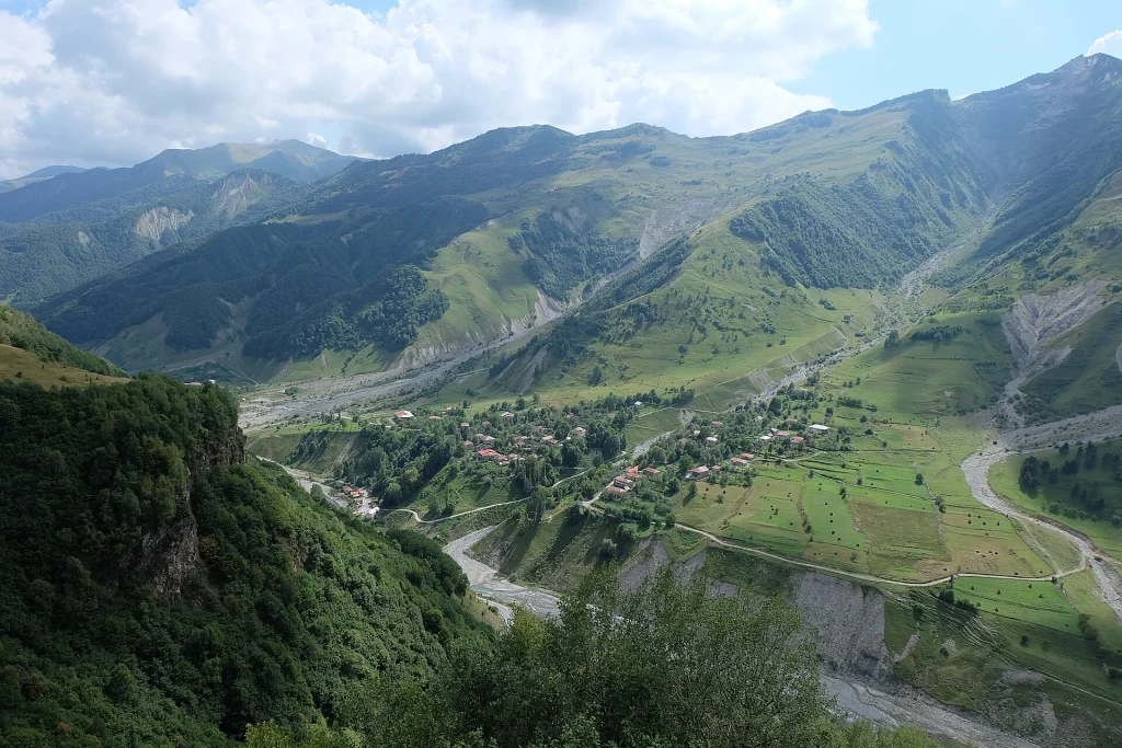 Zemo Mleta village nestled in a lush green valley along the Georgian Military Highway.