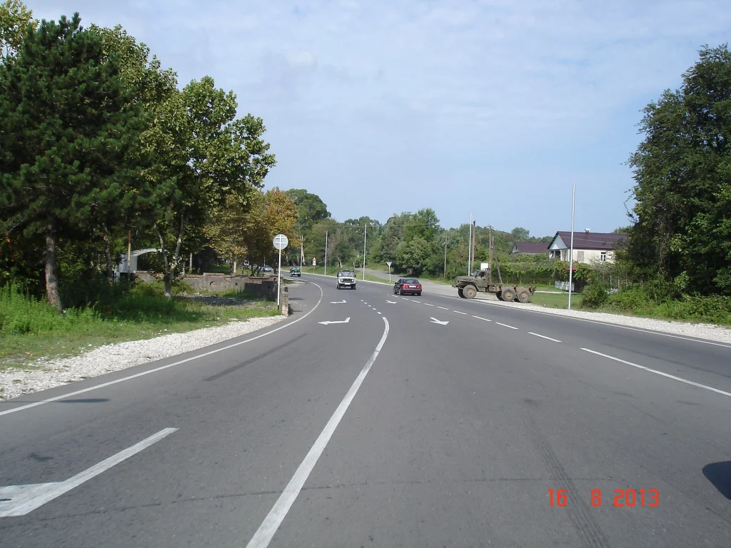 The Tbilisi–Senaki–Leselidze highway (M1/E97) illustrates the paved two-lane roads common across Georgia.