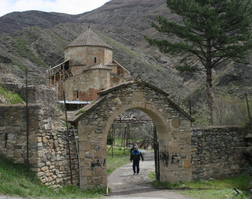 Stone archway gate leading to the Ateni Sioni church complex.