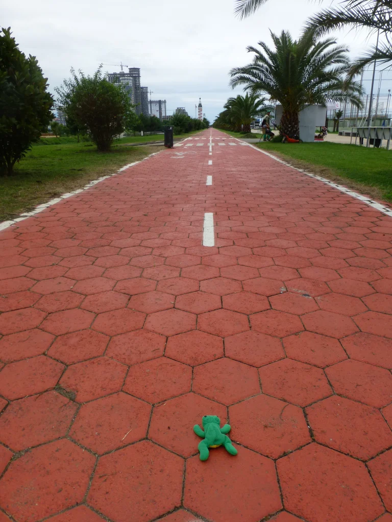 A palm-lined promenade along the Batumi boulevard on the Black Sea coast.